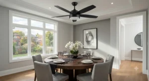 A contemporary smart ceiling fan for a dining room controlled via a wall switch and remote integration.