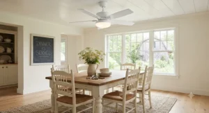 White casual dining room ceiling fan complementing a bright farmhouse-style dining table and casual decor.