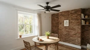 A matte black ceiling fan for breakfast nook adding an industrial accent to a bright eat-in kitchen space.